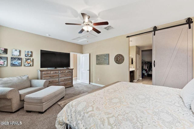 18309 N Crestview Ln, Maricopa, AZ 85138 - carpeted bedroom featuring a barn door, baseboards, a ceiling fan, and ensuite bath