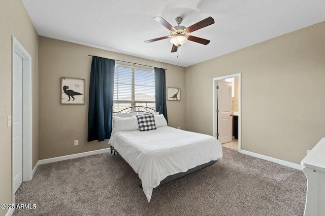 18309 N Crestview Ln, Maricopa, AZ 85138 - bedroom with light carpet, baseboards, a ceiling fan, and ensuite bathroom