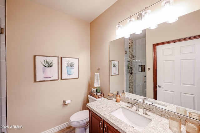 5350 E Deer Valley Dr Unit 2246, Phoenix, AZ 85054 - full bath with toilet, a tile shower, vanity, and baseboards