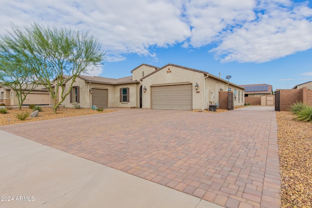 view of front of property featuring a garage