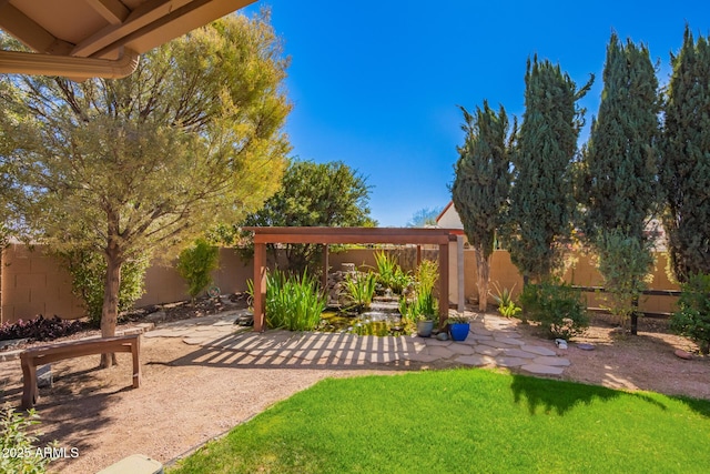 view of yard with a fenced backyard