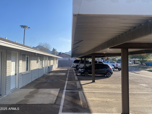 view of parking with a carport