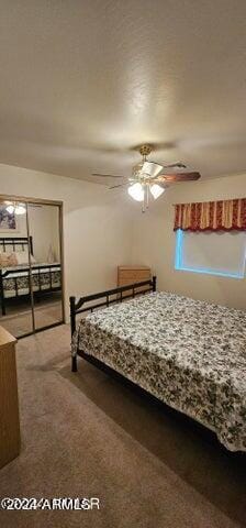 bedroom with multiple windows, carpet, and ceiling fan