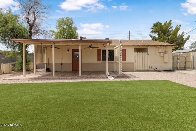 7250 E Mckellips Rd, Scottsdale, AZ 85257 - back of property featuring ceiling fan, a patio area, a gate, and stucco siding