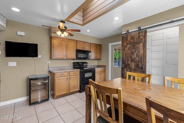 7250 E Mckellips Rd, Scottsdale, AZ 85257 - kitchen with black appliances, a ceiling fan, light tile patterned flooring, baseboards, and recessed lighting
