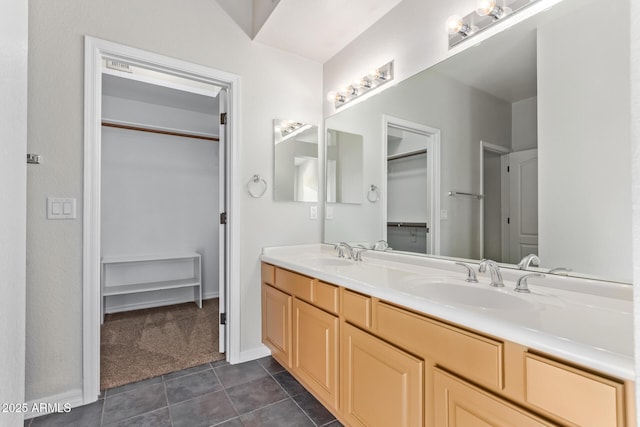 bathroom featuring vanity and tile patterned flooring