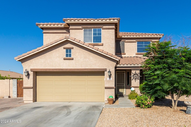 view of front of home with a garage