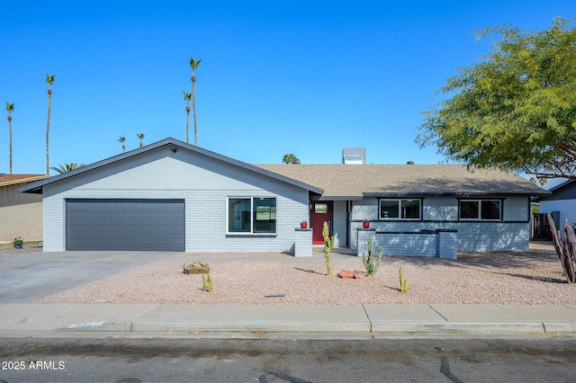 ranch-style home with a garage