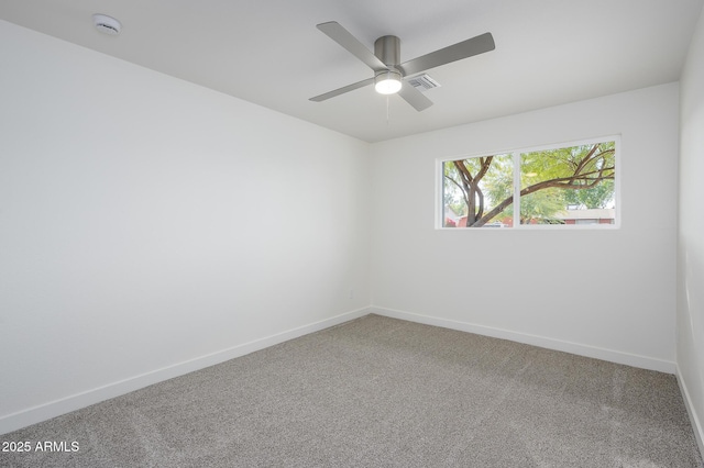 carpeted empty room with ceiling fan