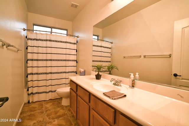 full bathroom featuring vanity, toilet, and shower / tub combo with curtain