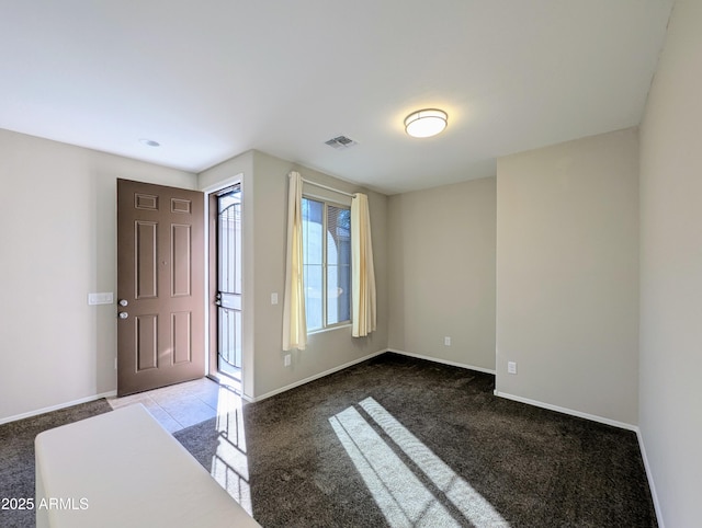 entryway featuring carpet flooring