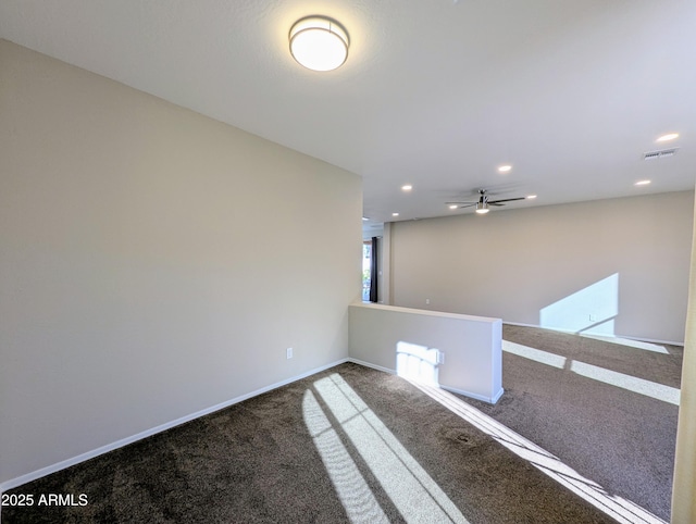 empty room with carpet flooring