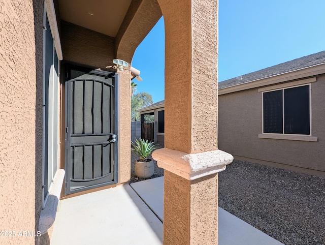 doorway to property featuring a patio area