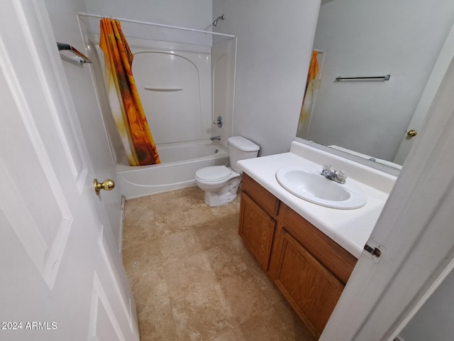 full bathroom featuring shower / bath combination with curtain, vanity, and toilet