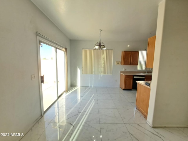 kitchen with dishwasher, a chandelier, decorative light fixtures, and sink