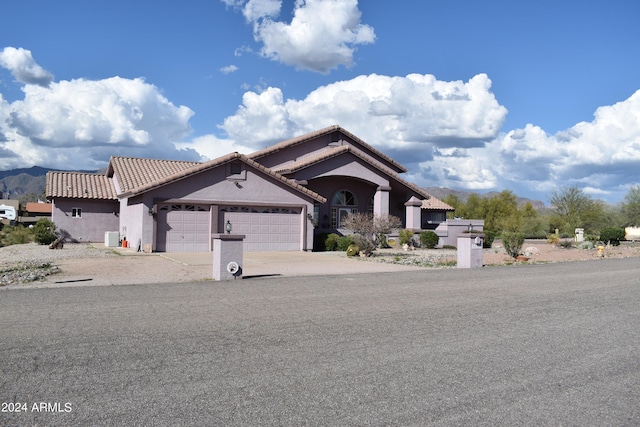 view of front of home with a garage