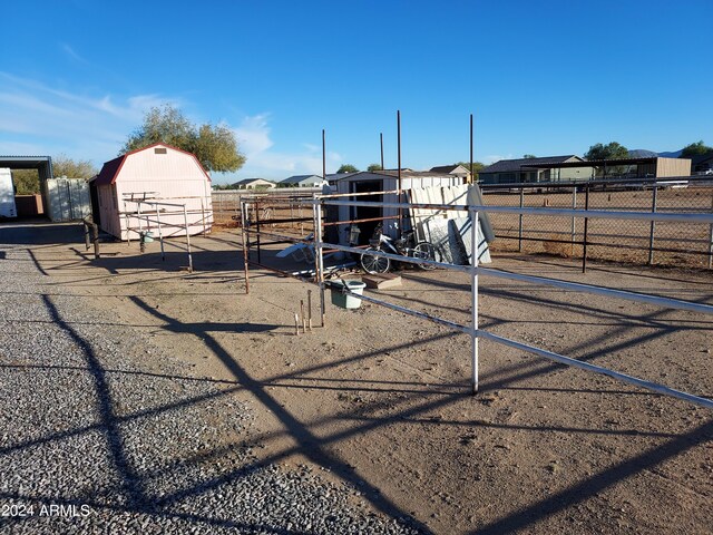 exterior space with a storage shed