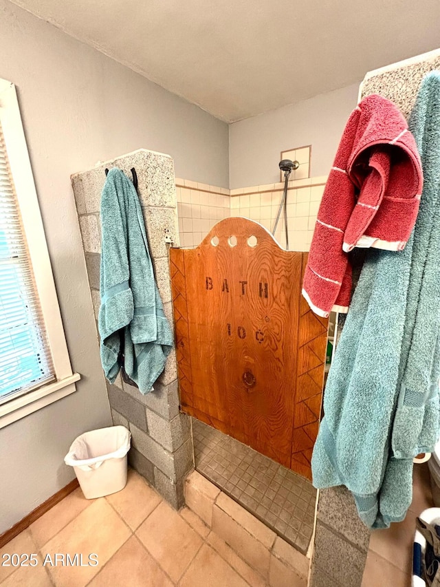 bathroom with tile patterned floors