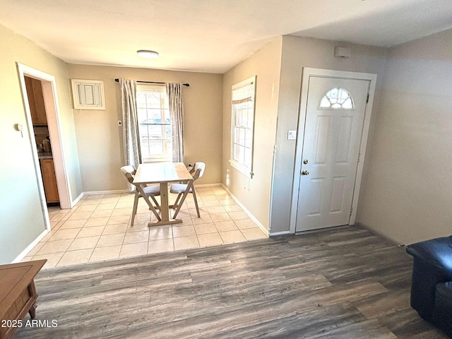 foyer with light hardwood / wood-style flooring