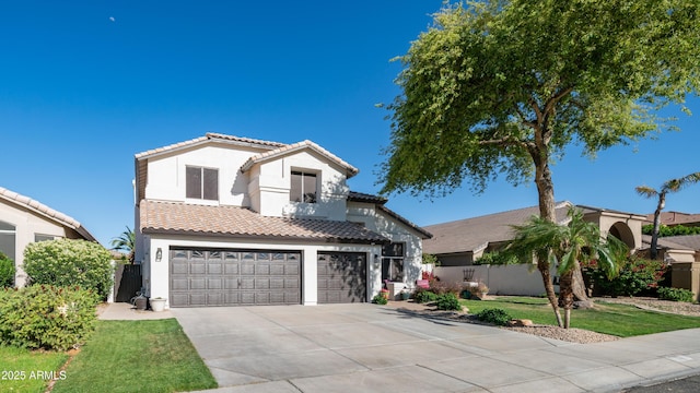 3411 S Vine St, Chandler, AZ 85248 - mediterranean / spanish house featuring a tile roof, an attached garage, fence, and stucco siding