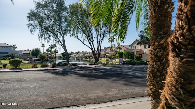 3411 S Vine St, Chandler, AZ 85248 - view of road with sidewalks, curbs, a residential view, and a water view