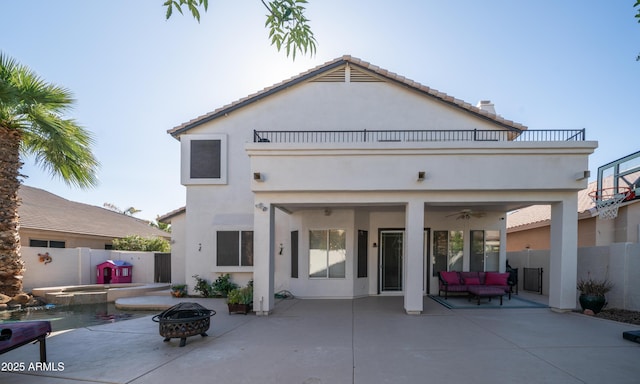 3411 S Vine St, Chandler, AZ 85248 - back of property featuring a fenced backyard, a patio, stucco siding, an in ground hot tub, and a balcony