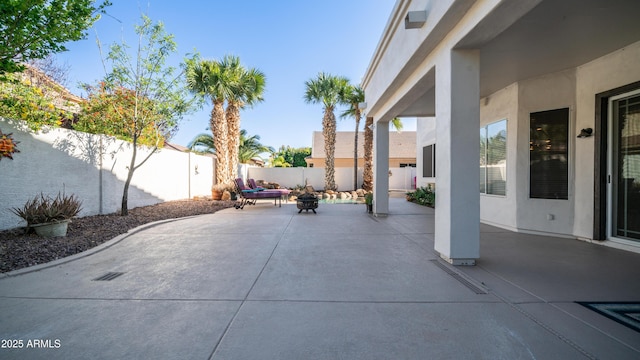 3411 S Vine St, Chandler, AZ 85248 - view of patio / terrace featuring a fenced backyard and a fire pit