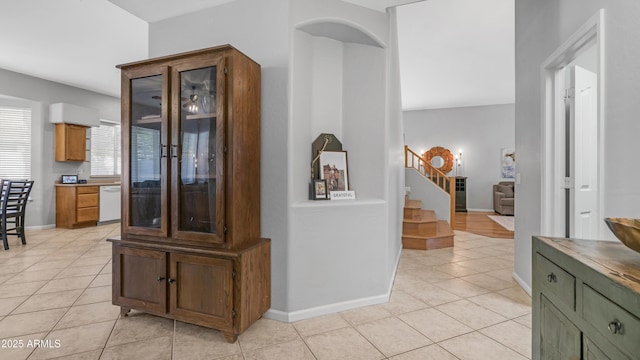 3411 S Vine St, Chandler, AZ 85248 - corridor featuring stairs, light tile patterned floors, and baseboards