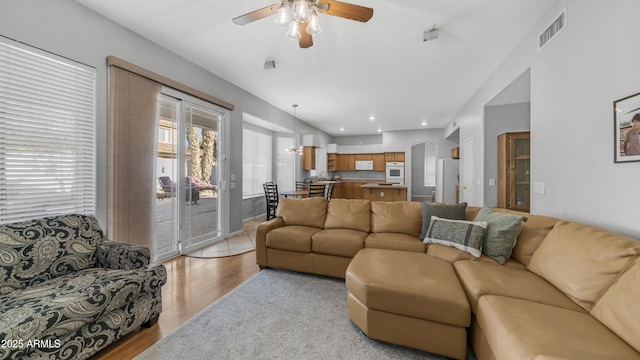 3411 S Vine St, Chandler, AZ 85248 - living room featuring light wood-style flooring, visible vents, ceiling fan, and recessed lighting