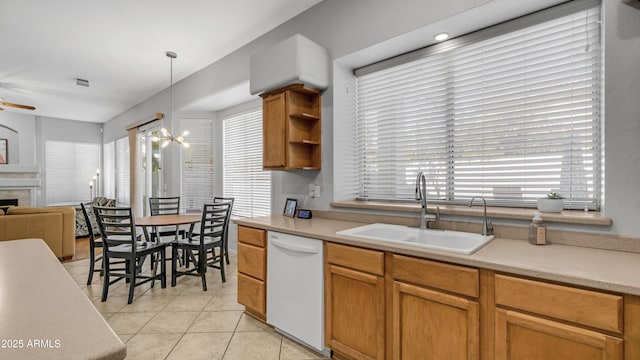 3411 S Vine St, Chandler, AZ 85248 - kitchen with light tile patterned floors, dishwasher, a sink, open floor plan, and light countertops