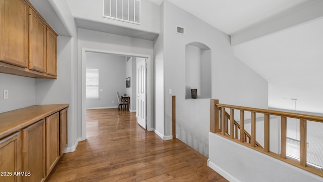 3411 S Vine St, Chandler, AZ 85248 - hall with an upstairs landing, visible vents, baseboards, and wood finished floors