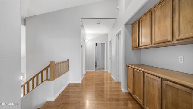 3411 S Vine St, Chandler, AZ 85248 - hall with light wood-style floors, baseboards, and an upstairs landing