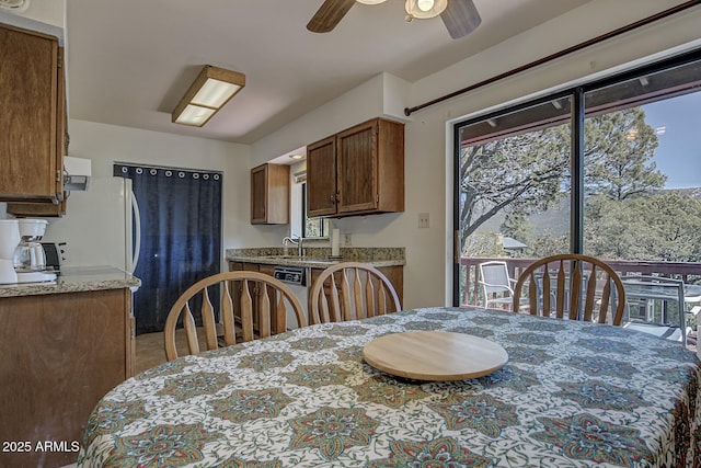 dining area with a ceiling fan