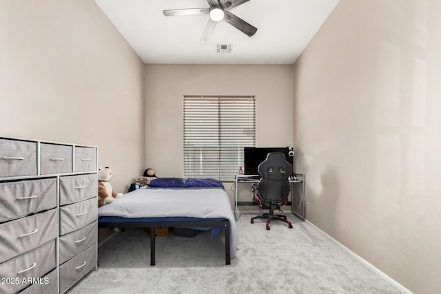 bedroom with visible vents, a ceiling fan, baseboards, and carpet floors