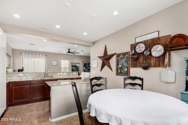 dining area with recessed lighting, ceiling fan, and light tile patterned floors