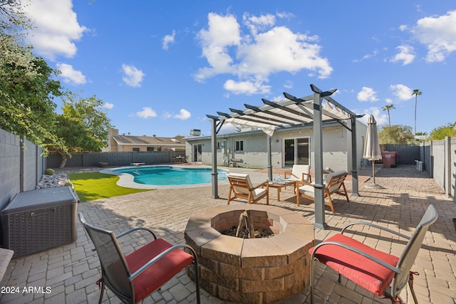 view of pool with an outdoor fire pit, a pergola, and a patio area