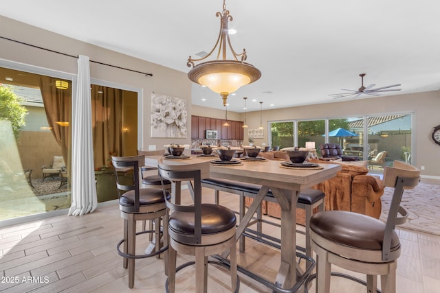 10650 E Palladium Dr, Mesa, AZ 85212 - dining space with ceiling fan, light wood-type flooring, and recessed lighting