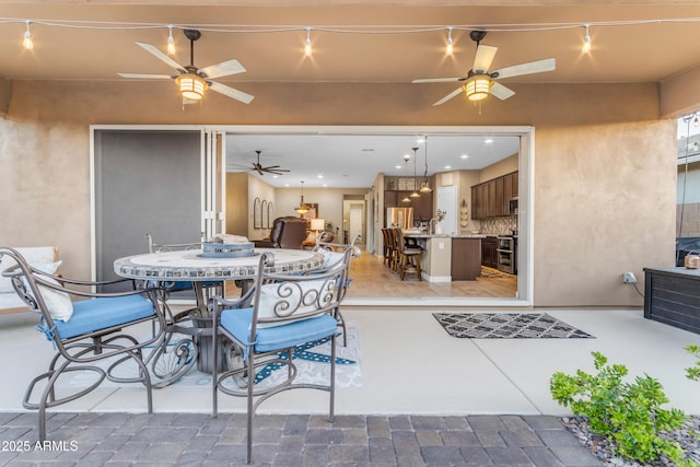 10650 E Palladium Dr, Mesa, AZ 85212 - view of patio / terrace with ceiling fan and outdoor dining space