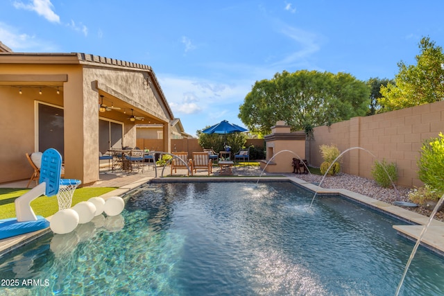10650 E Palladium Dr, Mesa, AZ 85212 - view of swimming pool featuring a fenced backyard, a ceiling fan, outdoor dining area, and a patio area
