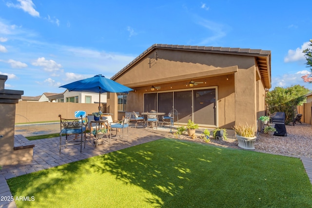10650 E Palladium Dr, Mesa, AZ 85212 - rear view of house featuring a fenced backyard, ceiling fan, stucco siding, and a patio area