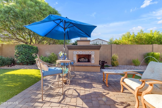 10650 E Palladium Dr, Mesa, AZ 85212 - view of patio featuring exterior fireplace