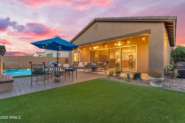 10650 E Palladium Dr, Mesa, AZ 85212 - back of house with a patio area and stucco siding