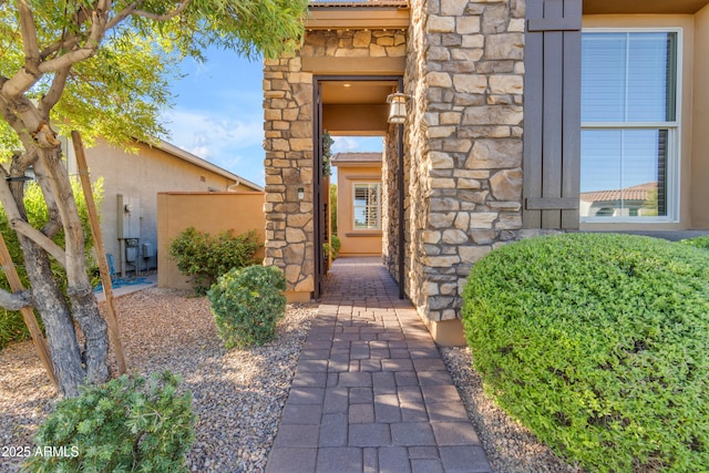 10650 E Palladium Dr, Mesa, AZ 85212 - entrance to property featuring stone siding