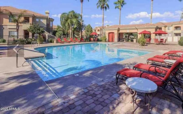 1941 S Pierpont Dr Unit 1099, Mesa, AZ 85206 - community pool featuring a patio area
