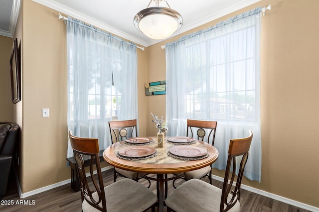 1941 S Pierpont Dr Unit 1099, Mesa, AZ 85206 - dining area with crown molding, baseboards, and dark wood finished floors