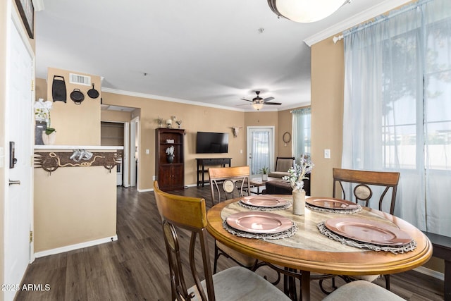1941 S Pierpont Dr Unit 1099, Mesa, AZ 85206 - dining space with wood finished floors, a ceiling fan, baseboards, and crown molding