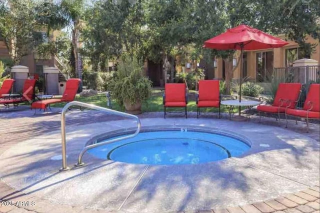 1941 S Pierpont Dr Unit 1099, Mesa, AZ 85206 - view of pool with a patio, a hot tub, and a swimming pool