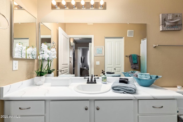 1941 S Pierpont Dr Unit 1099, Mesa, AZ 85206 - full bath featuring vanity and a textured wall