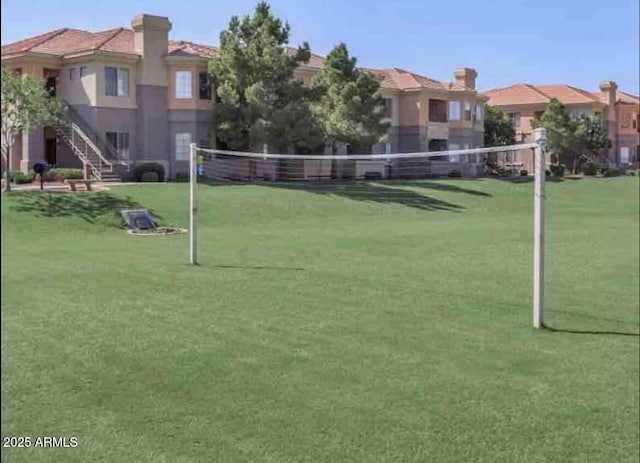 1941 S Pierpont Dr Unit 1099, Mesa, AZ 85206 - view of property's community with volleyball court and a yard