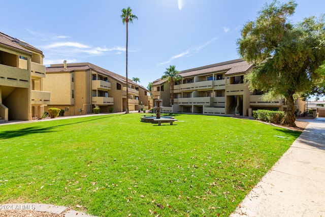 view of community featuring a lawn